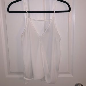 White crossover styled sheer blouse